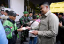 Warga Antusias, Gubernur Bobby Nasution Bagikan 2.500 Bingkisan dari Presiden di Malam Idulfitri